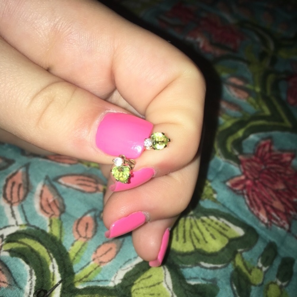 Gold with Green and white diamond
